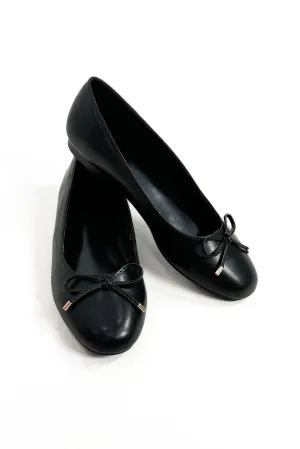 She's a Classic Ballet Flat in Black